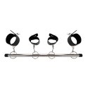 Spreader bar with wrist and ankle cuffs
