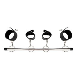 Spreader bar with wrist and ankle cuffs